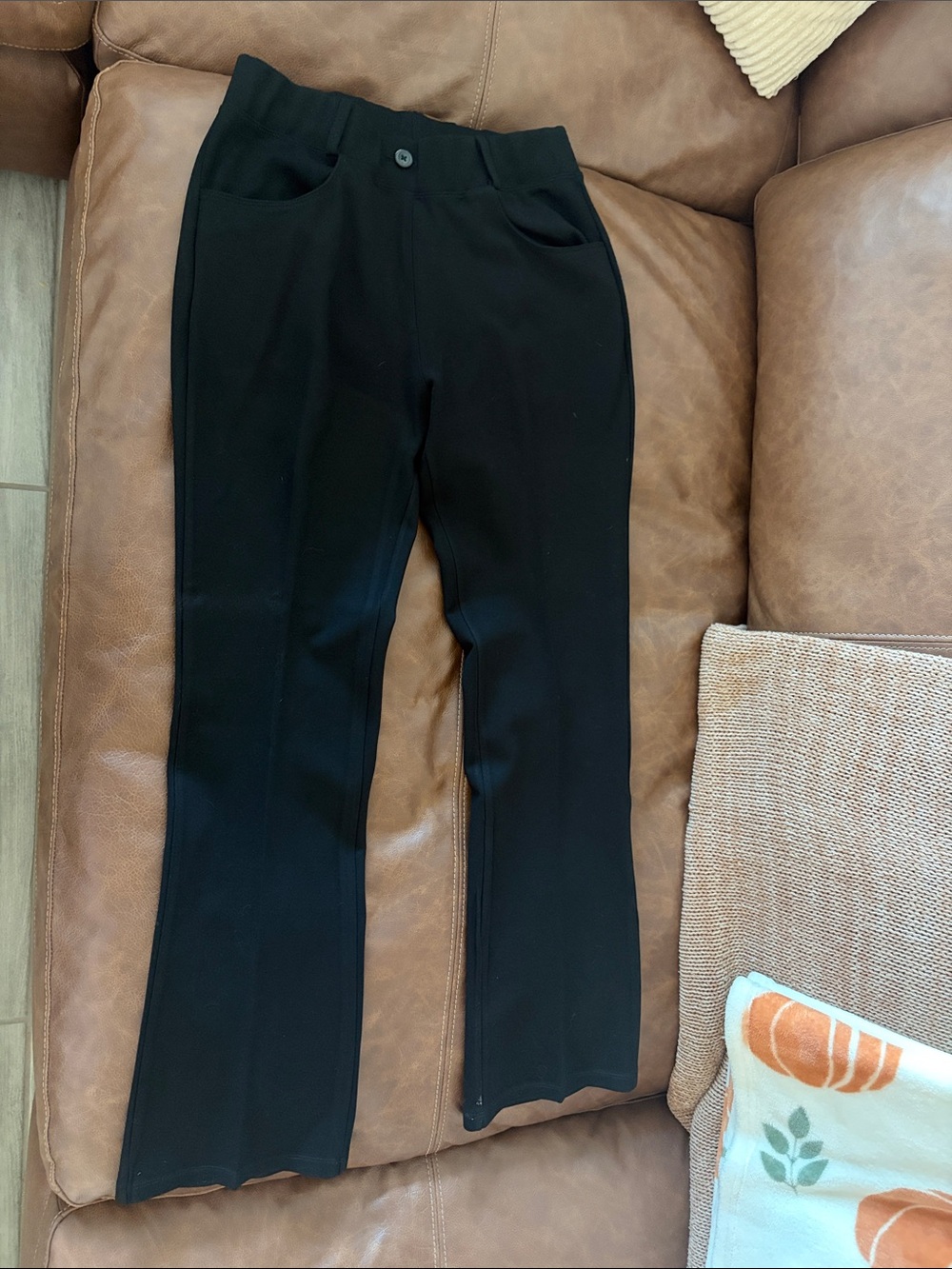 Black Women's Flare Jeans - Sleek Mid-Rise Flared Trousers
